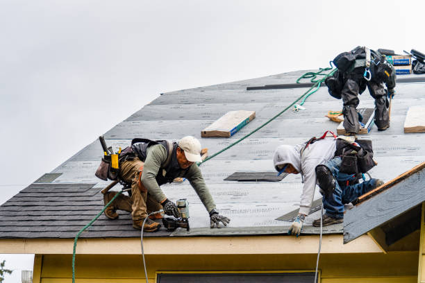Professional Gutter Installation technician working in Troy, IN